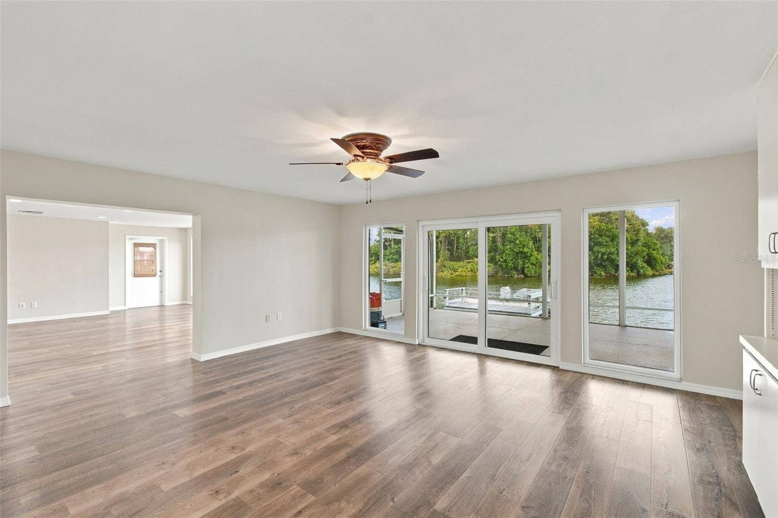 1615 BUNKER HILL DRIVE, Sun City Center, FL 33573 Dining room sliders to screen porch
