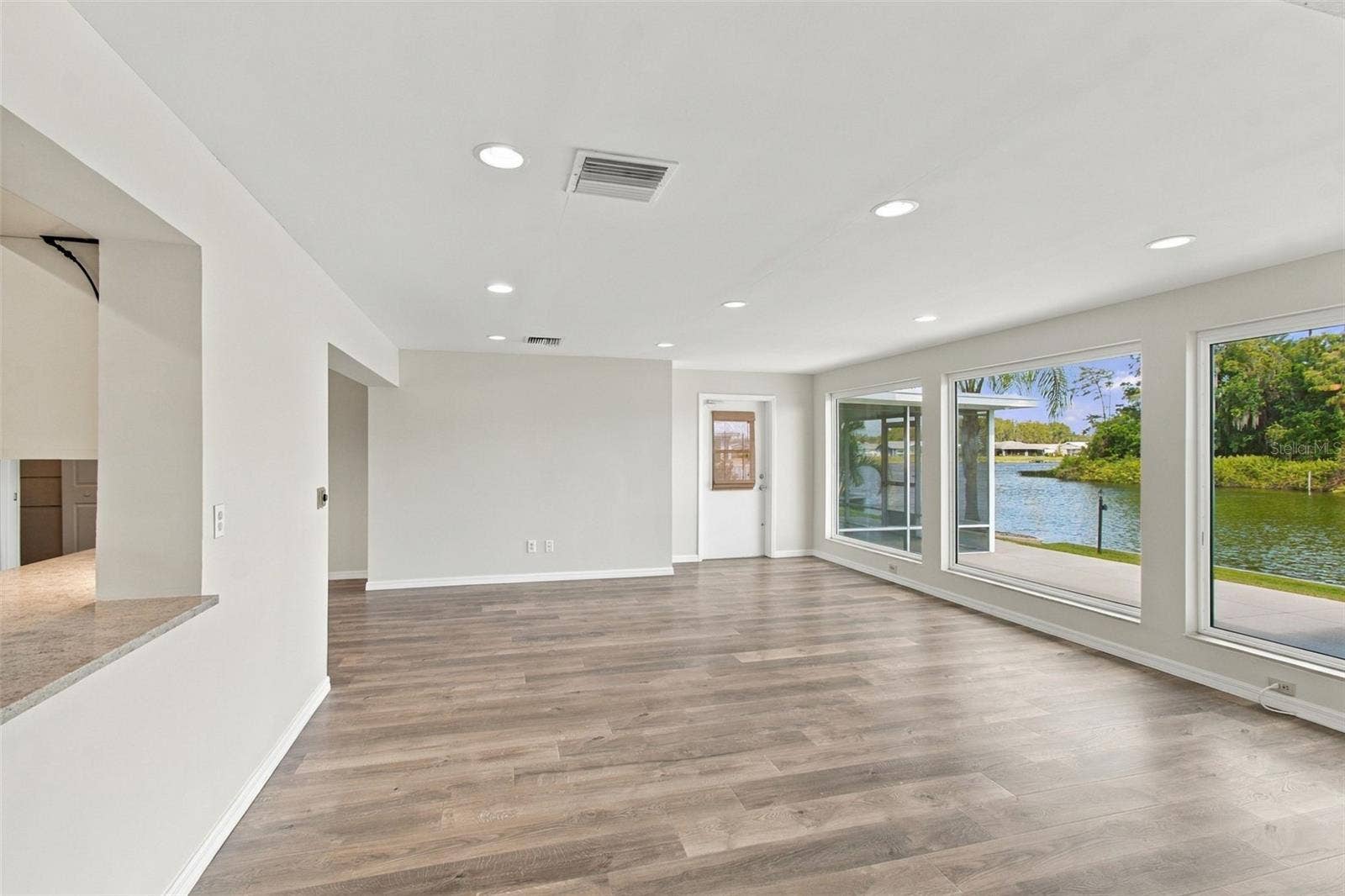 1615 BUNKER HILL DRIVE, Sun City Center, FL 33573 Family room, pass through from kitchen