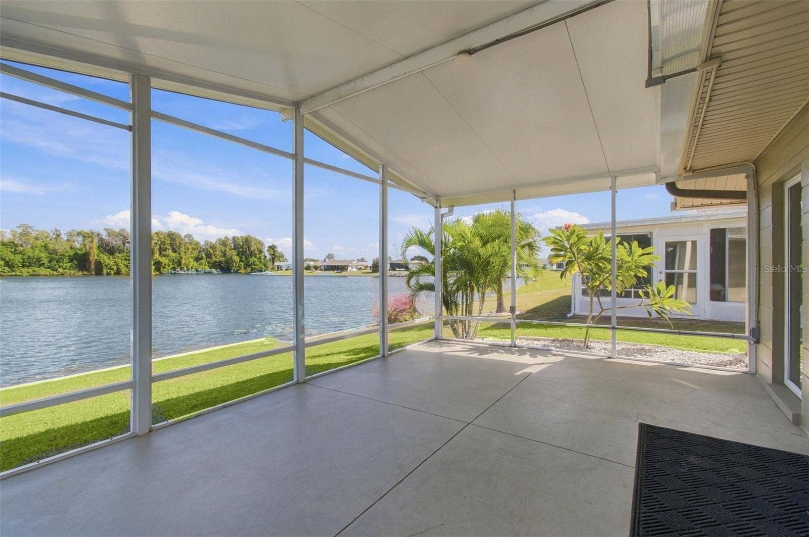 1615 BUNKER HILL DRIVE, Sun City Center, FL 33573 screen porch off dining room