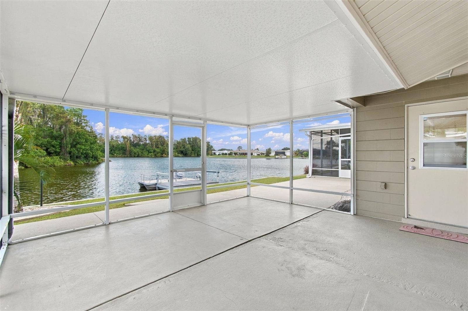 1615 BUNKER HILL DRIVE, Sun City Center, FL 33573 View from Screen porch off family room and primary BR