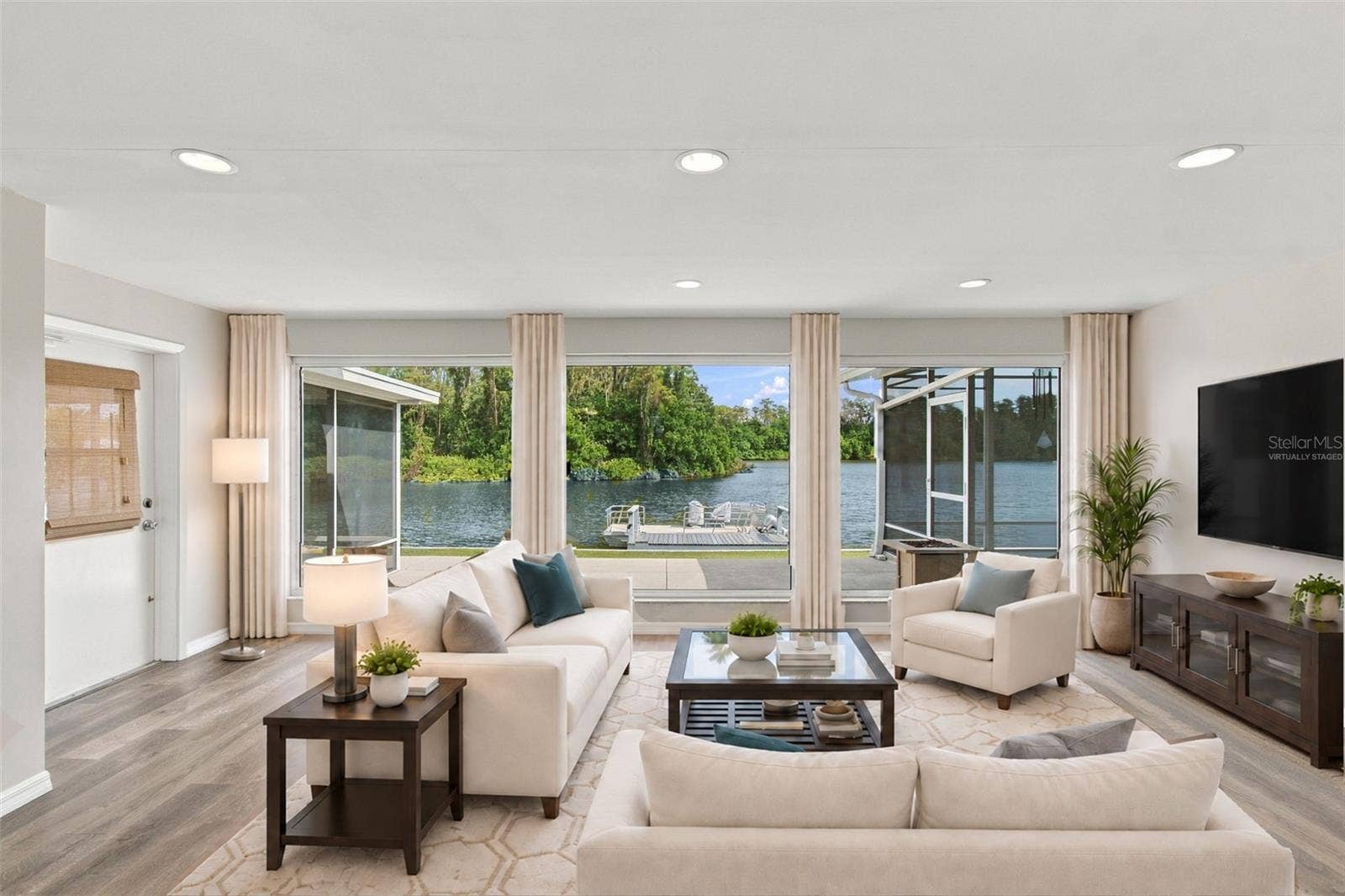 1615 BUNKER HILL DRIVE, Sun City Center, FL 33573 VIRTUALLY STAGED FAMILY ROOM