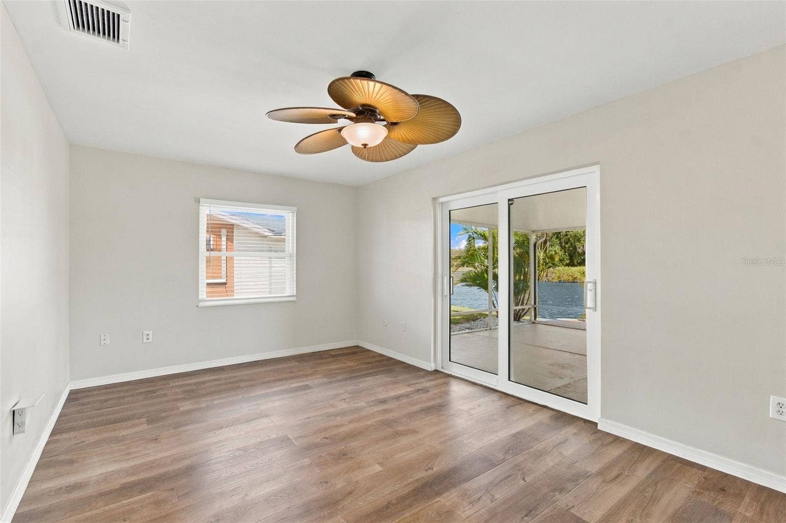 1615 BUNKER HILL DRIVE, Sun City Center, FL 33573 primary bedroom with lake view