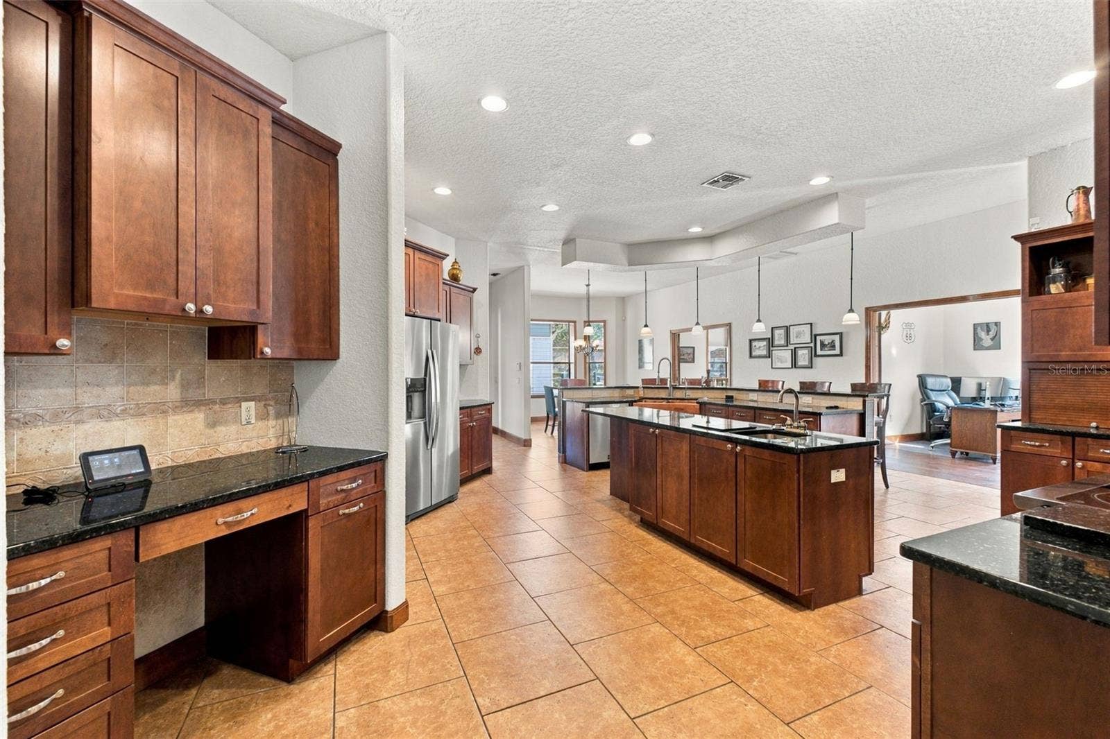 10484 GYPSY AVENUE, Weeki Wachee, FL 34613 KITCHEN WITH LARGE ISLAND