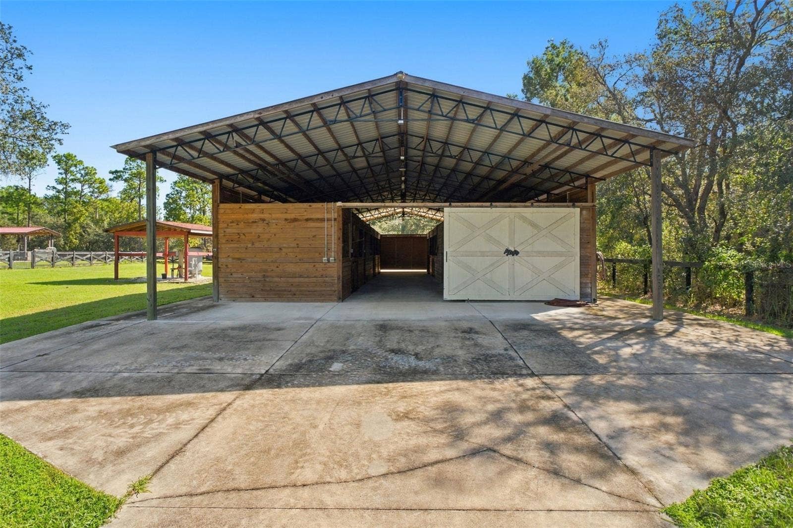 10484 GYPSY AVENUE, Weeki Wachee, FL 34613 9 STALL HORSE BARN