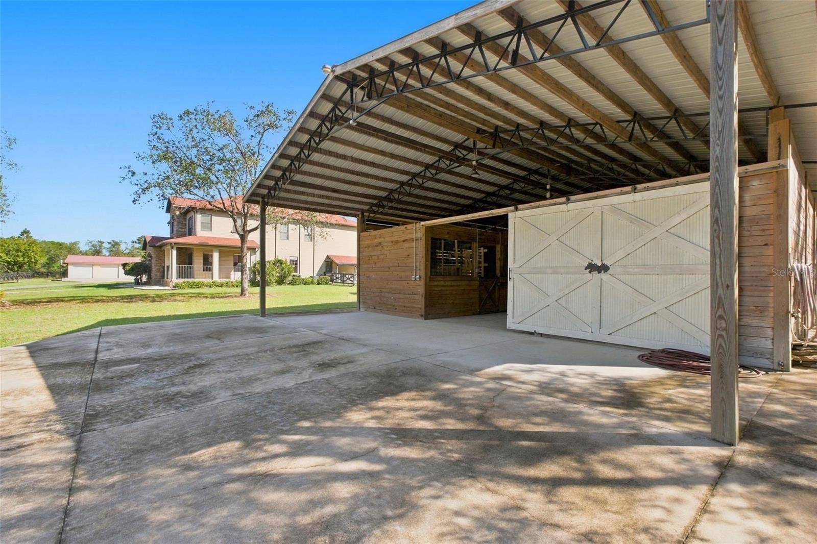 10484 GYPSY AVENUE, Weeki Wachee, FL 34613 9 STALL HORSE BARN