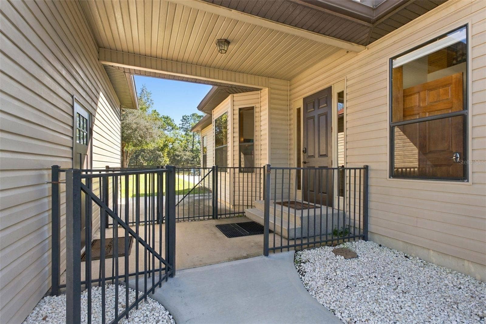 10484 GYPSY AVENUE, Weeki Wachee, FL 34613 BREEZEWAY TO GARAGE