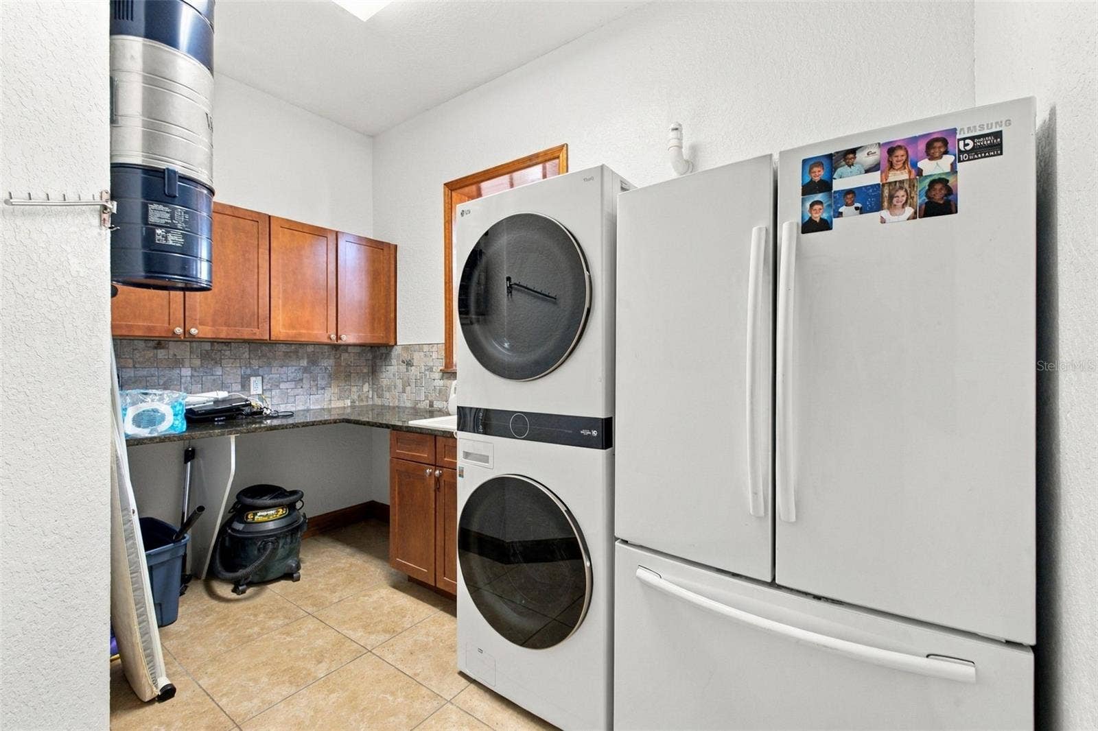 10484 GYPSY AVENUE, Weeki Wachee, FL 34613 DOWNSTAIRS UTILITY ROOM
