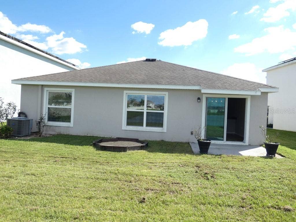 Zephyrhills, FL 33540 View of the Back of the Home: