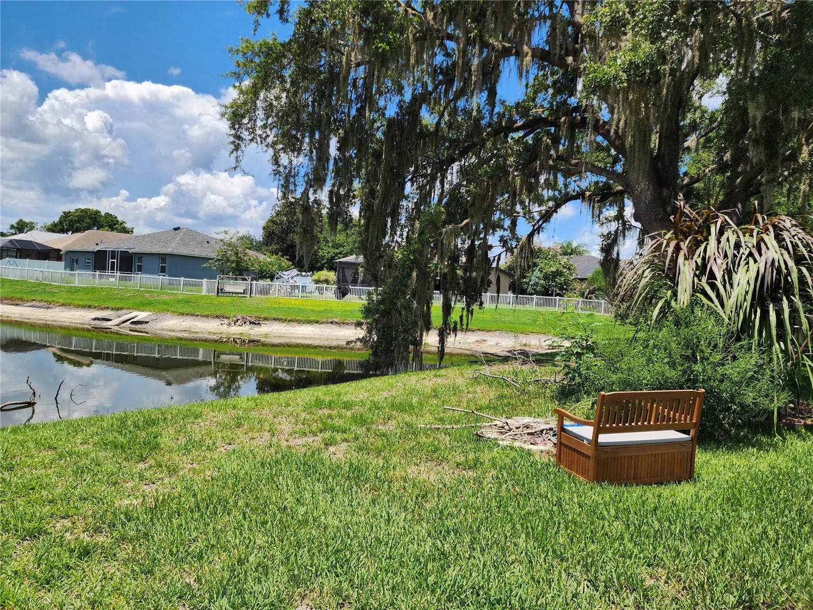 30702 IVERSON DRIVE, Wesley Chapel, FL 33543 Back yard looking out to pond