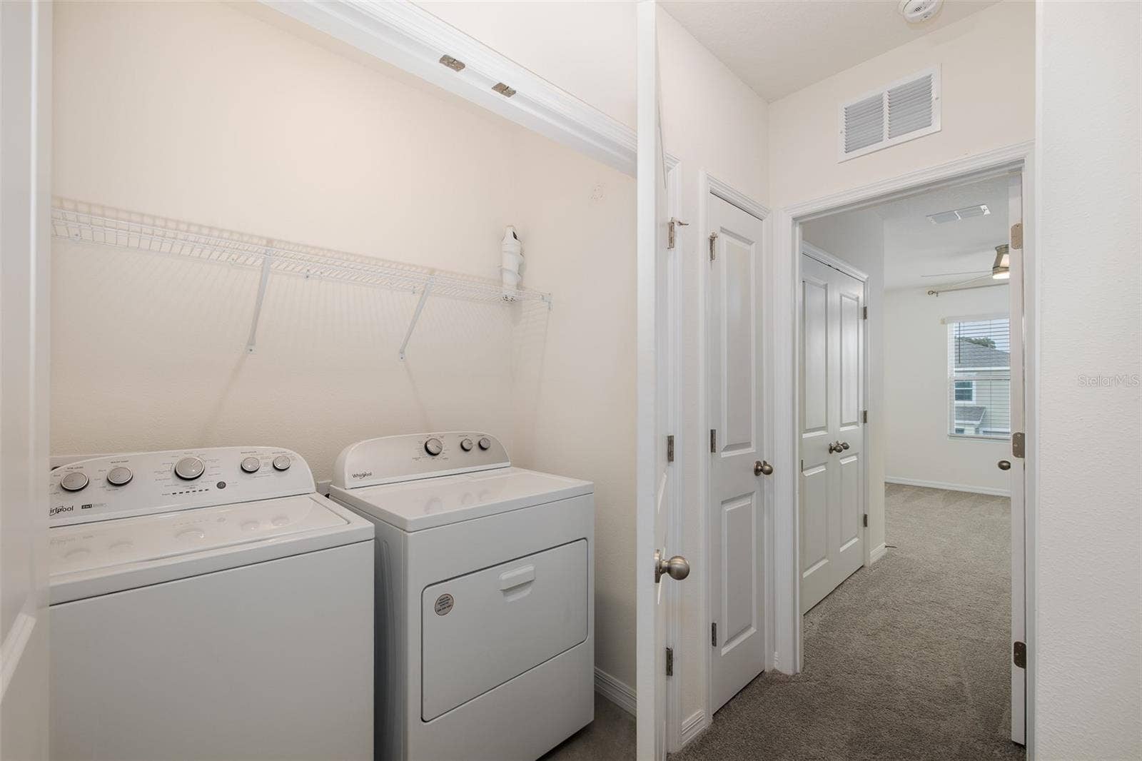 11166 CRESCENT DEER DRIVE, Land O Lakes, FL 34638 Laundry area upstairs with quick access to bedrooms
