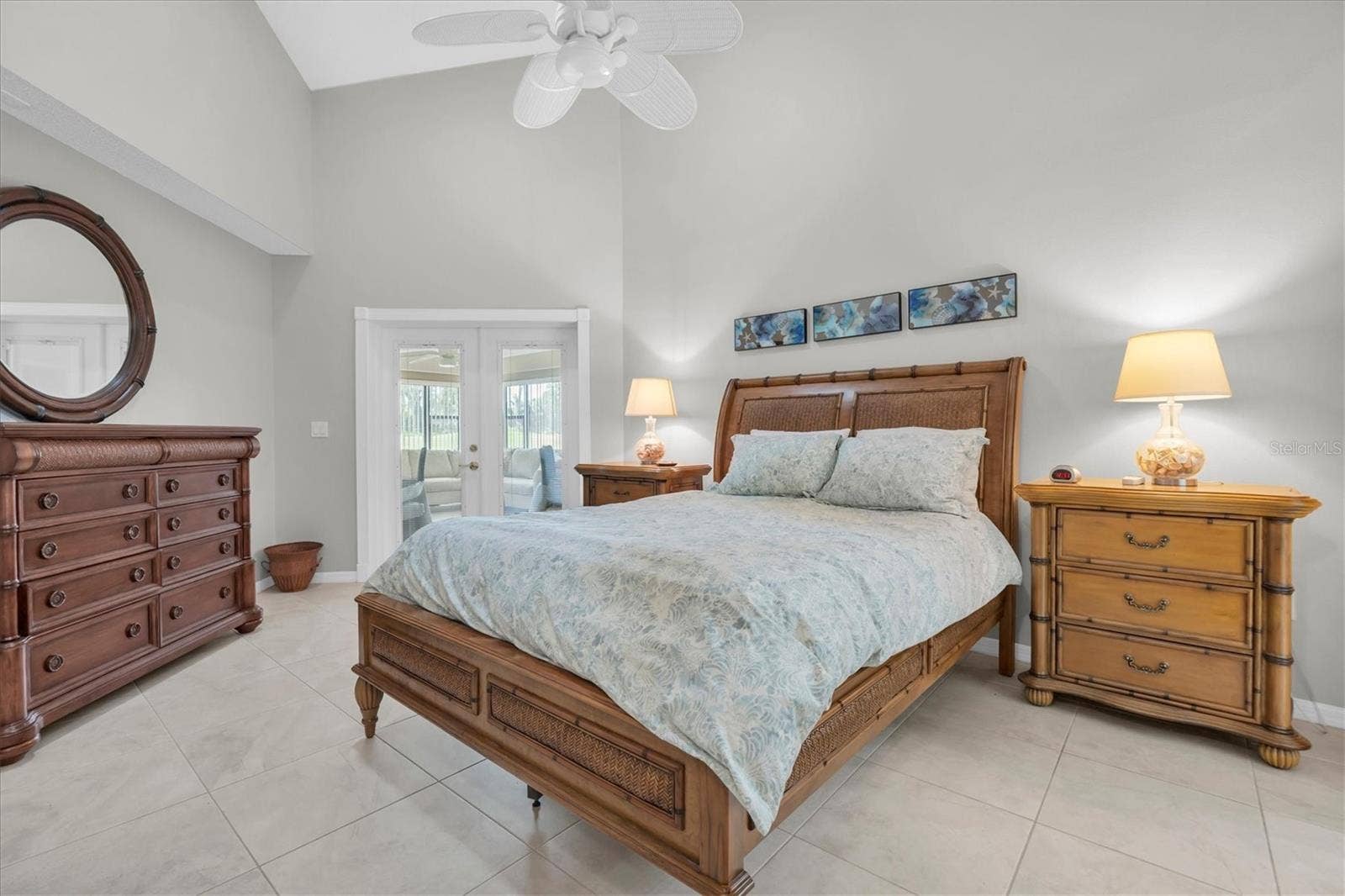 9126 BASSETT LANE, New Port Richey, FL 34655 owners suite with high ceilings and access to Florida room