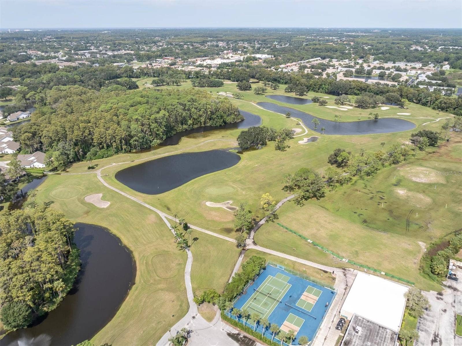 9126 BASSETT LANE, New Port Richey, FL 34655 your new home on golf course.
