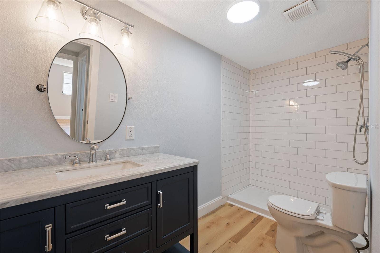8103 GULF WAY, Hudson, FL 34667 GUEST BATHROOM