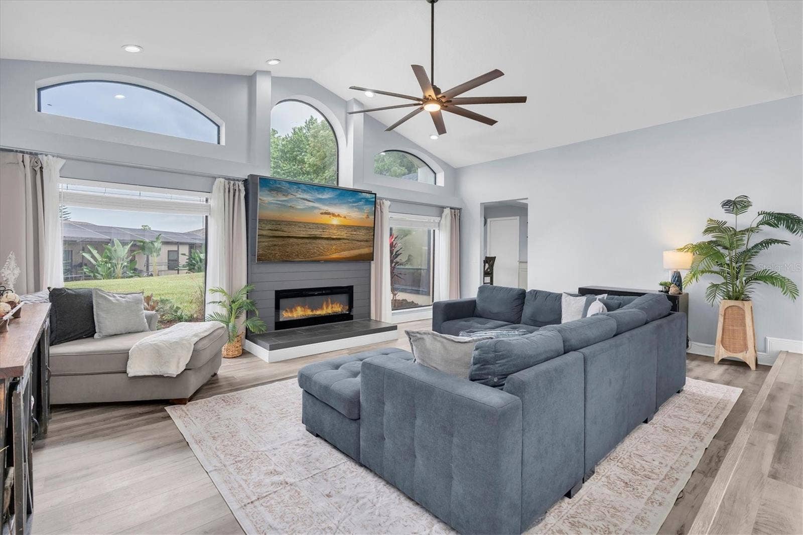 8721 LATHAM LANE, Hudson, FL 34667 Sunken Living Room & Floor-to-Ceiling Windows