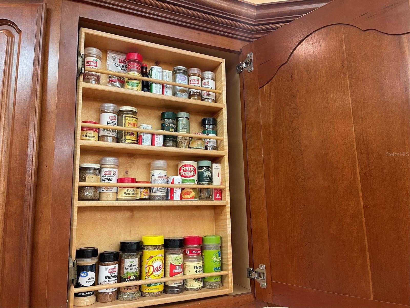 Hinged spice rack