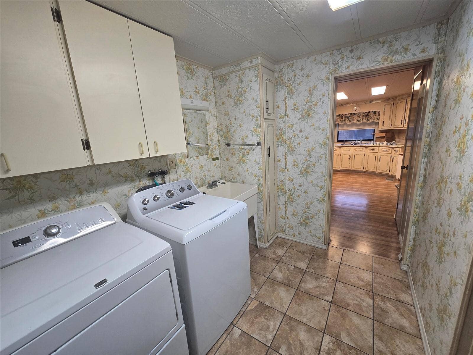16802 HARLEY STREET, Hudson, FL 34667 INSIDE LAUNDRYROOM