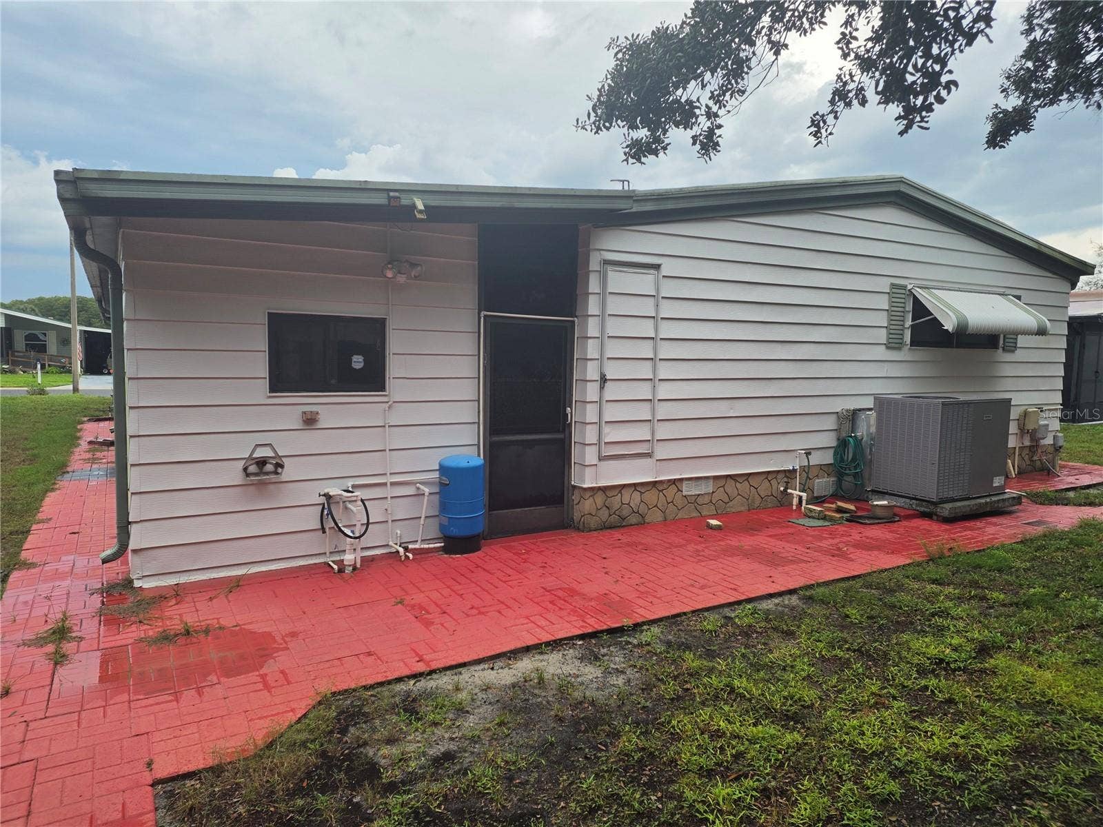 16802 HARLEY STREET, Hudson, FL 34667 EXTERIOR BACK OF HOME