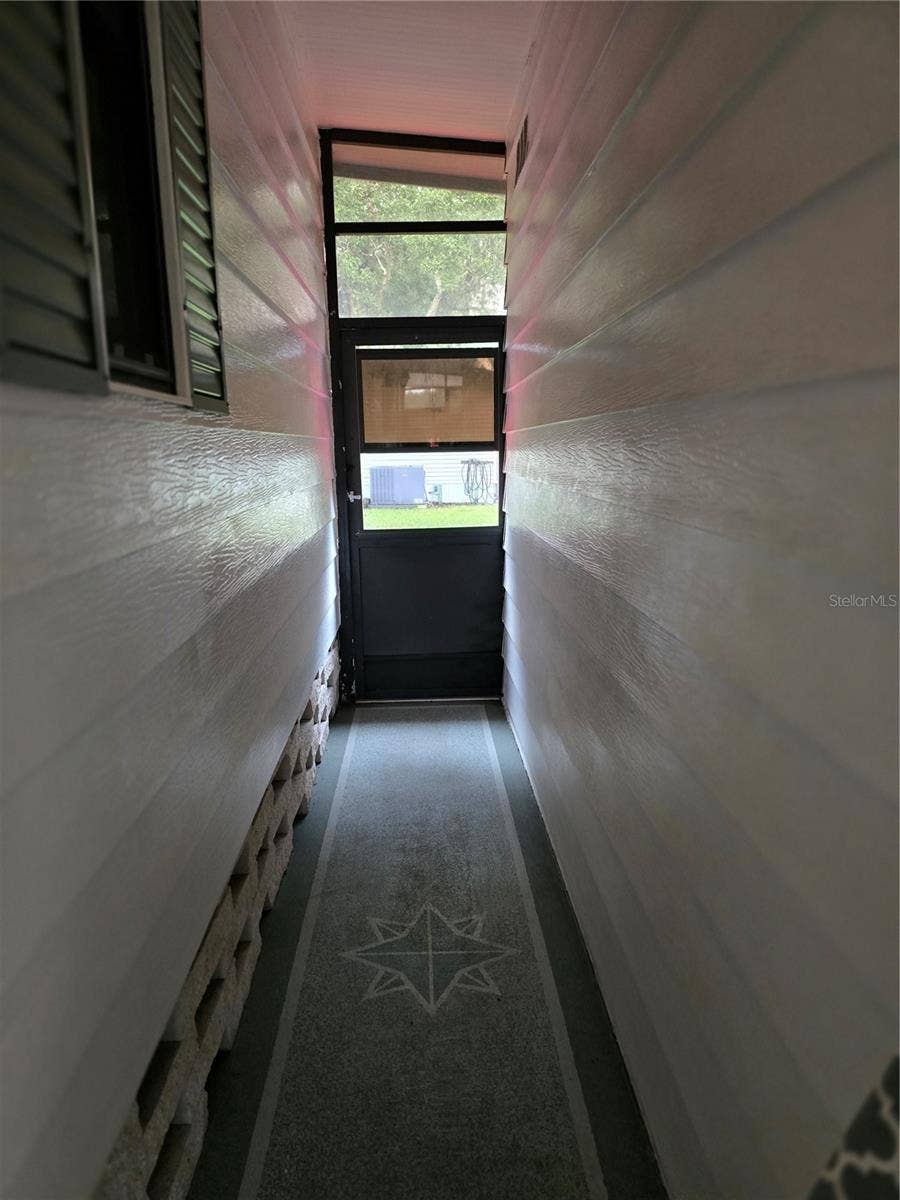 16802 HARLEY STREET, Hudson, FL 34667 DOOR TO BACK YARD