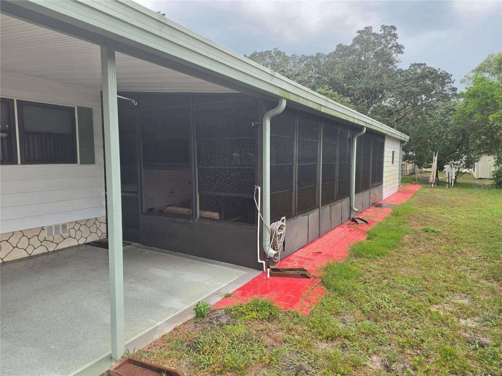 16802 HARLEY STREET, Hudson, FL 34667 CARPORT & LANAI
