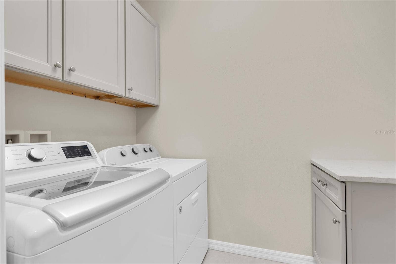 Laundry room with cabinetry