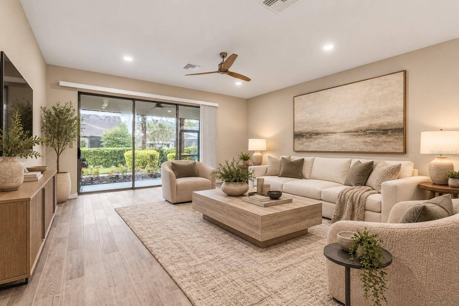 Great room with sliding glass doors to lanai