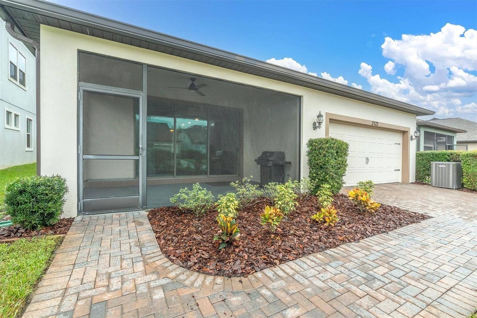 Backyard with paver patio and landscaping