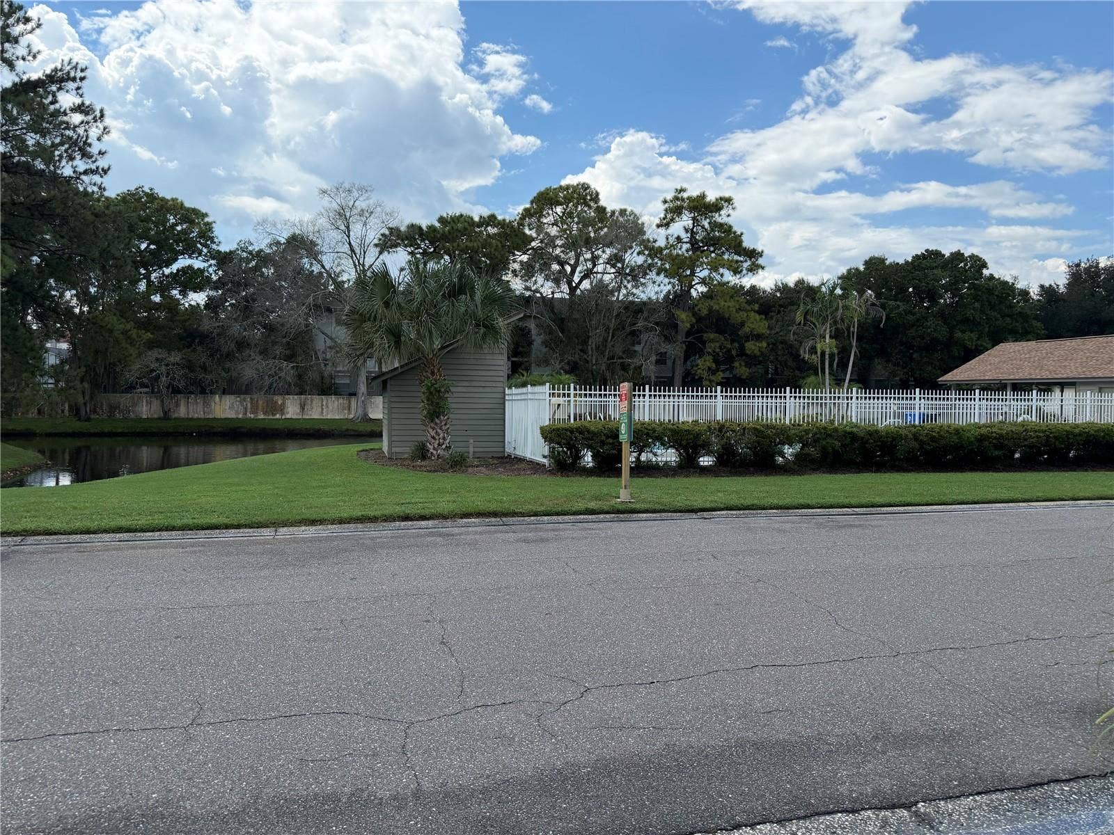 13811 LAZY OAK DRIVE, #21, Tampa, FL 33613 View of Community Pool and Water Feature