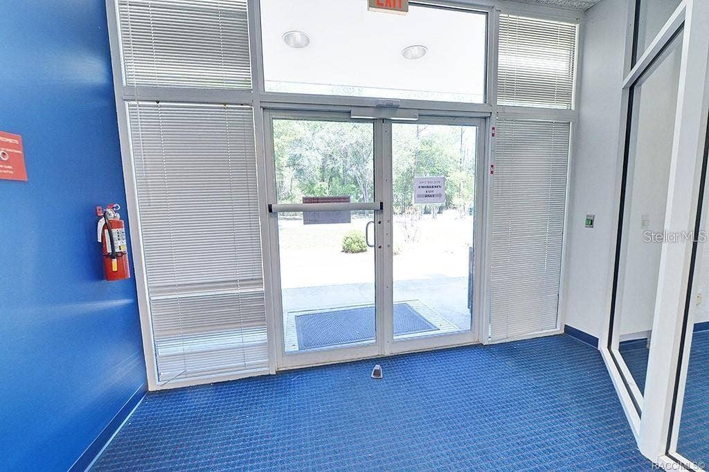 10241 N FLORIDA AVENUE, Citrus Springs, FL 34434 Interior view toward the glazed building entrance.