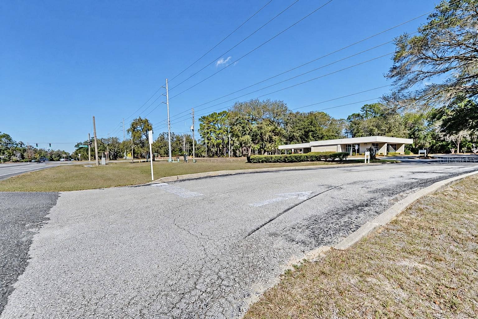 10241 N FLORIDA AVENUE, Citrus Springs, FL 34434 Corner location at US Highway 41 and North Citrus Springs Boulevard. Digitally edited to remove former bank signage.