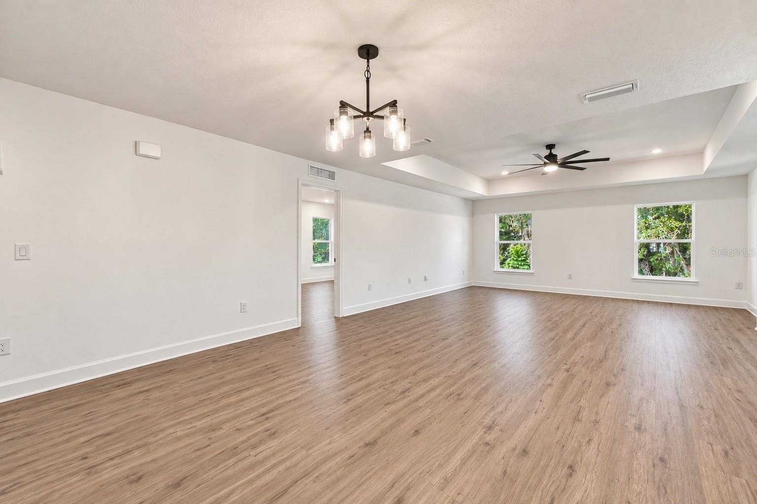 11041 SPOONBILL ROAD, Weeki Wachee, FL 34613 Living room/combo dining room