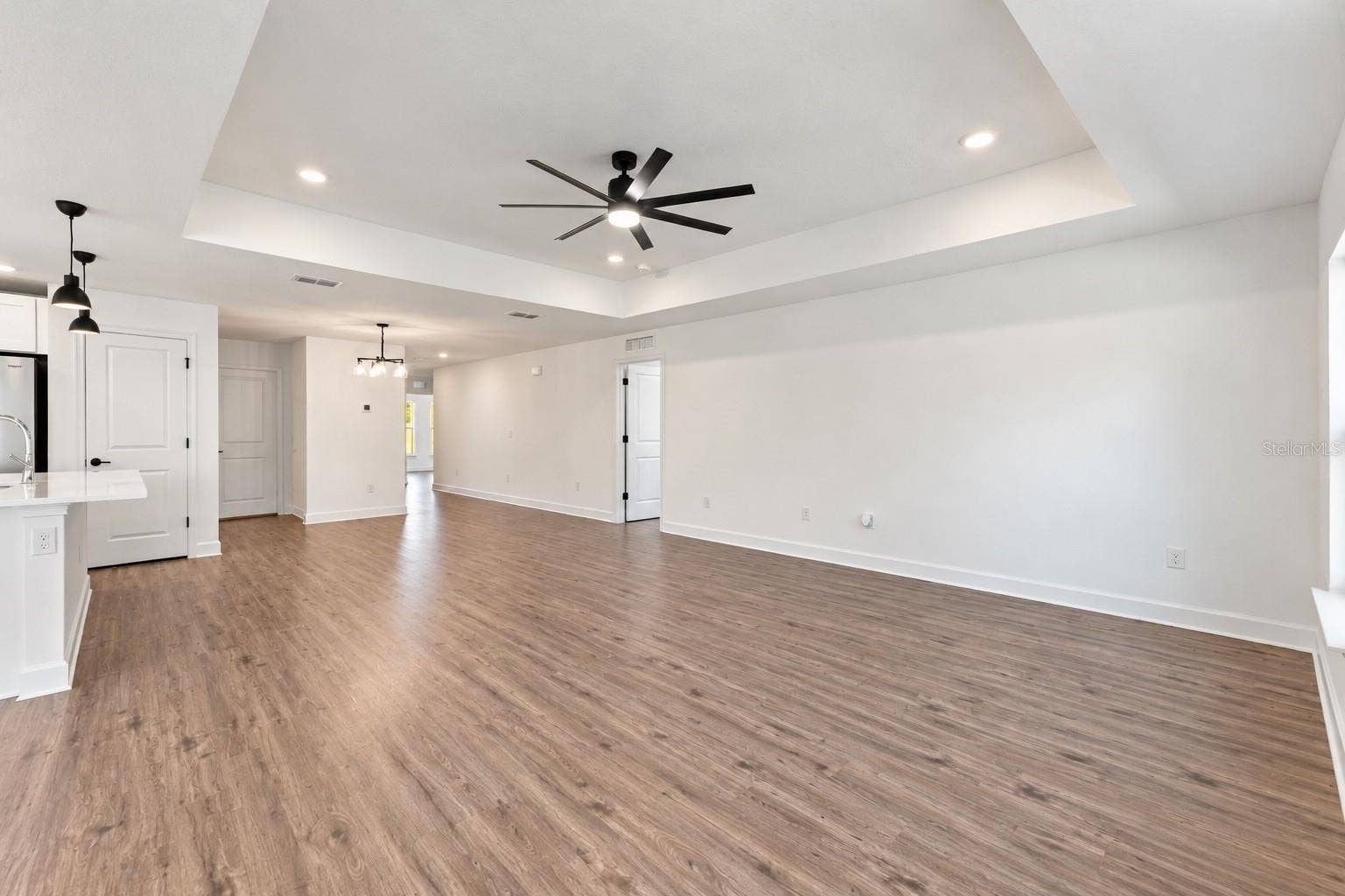 11041 SPOONBILL ROAD, Weeki Wachee, FL 34613 Living room/combo dining room