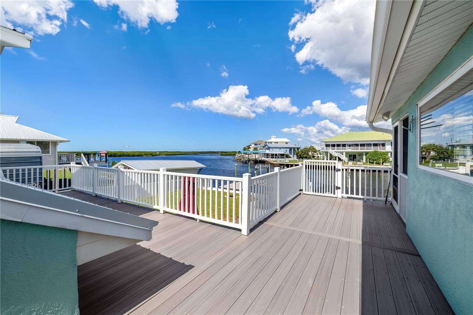 3337 MANGROVE DRIVE, Hernando Beach, FL 34607 Shared Back upper level porch shared by unit 1&2