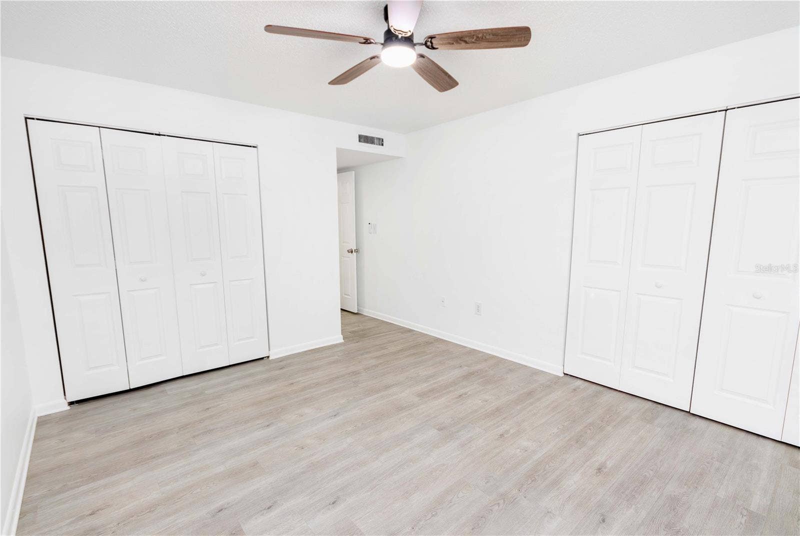 owners suite with dual closets