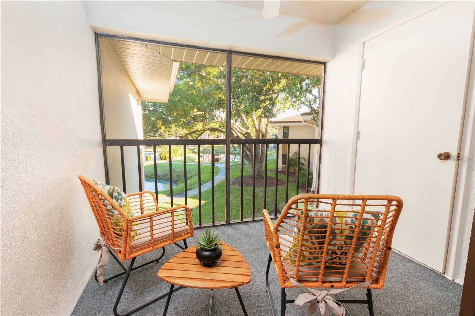 porch overlooking pool and ponds