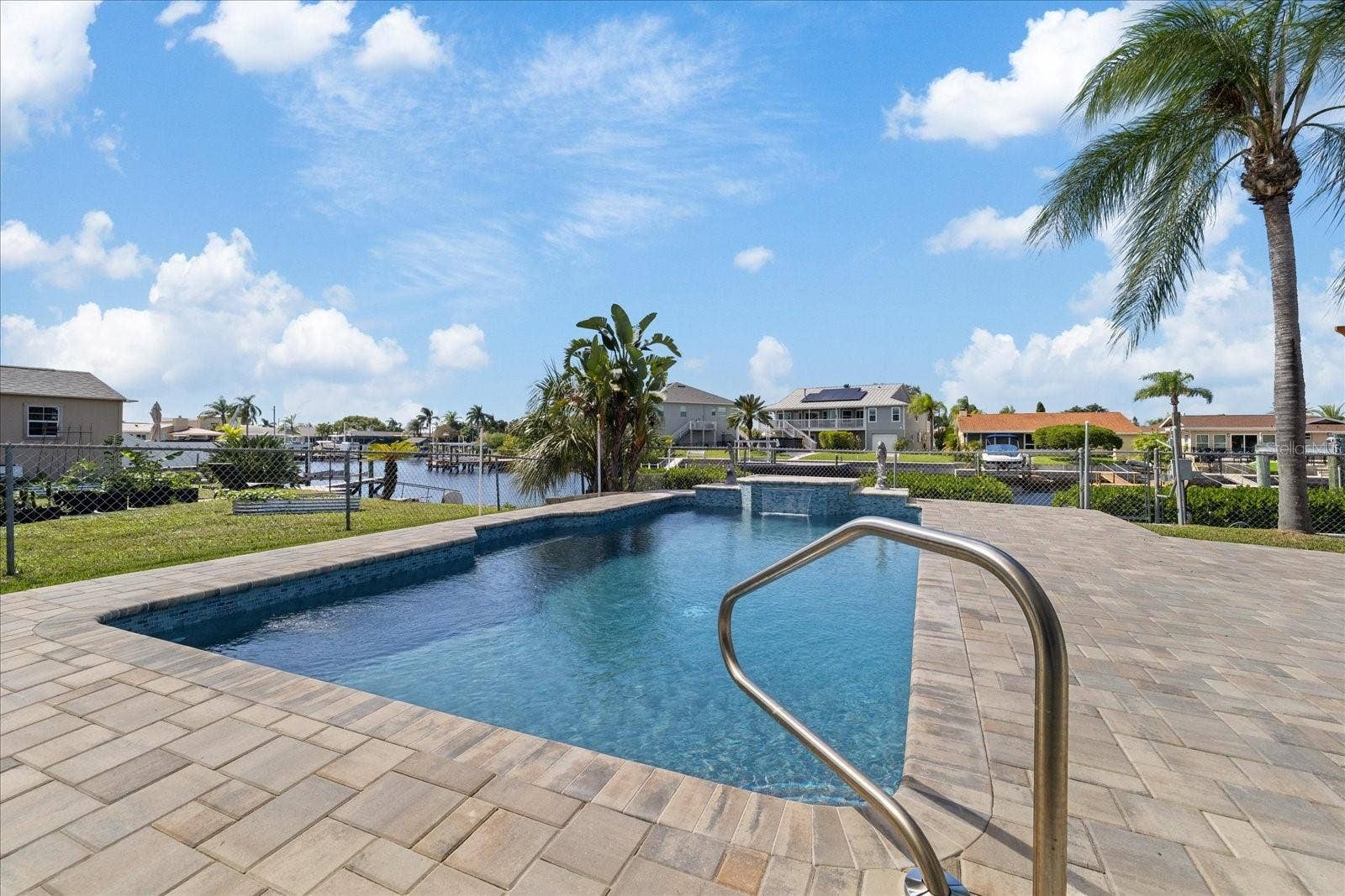 5001 MARLIN DRIVE, New Port Richey, FL 34652 Newly refinished pool and pavered deck.