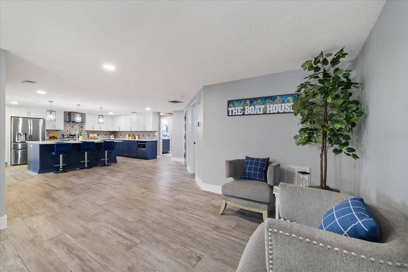 5001 MARLIN DRIVE, New Port Richey, FL 34652 Sitting area near dining and kitchen spaces