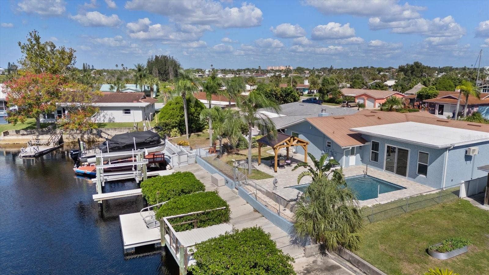 5001 MARLIN DRIVE, New Port Richey, FL 34652 view looking north along docks, boat lift and mangroves