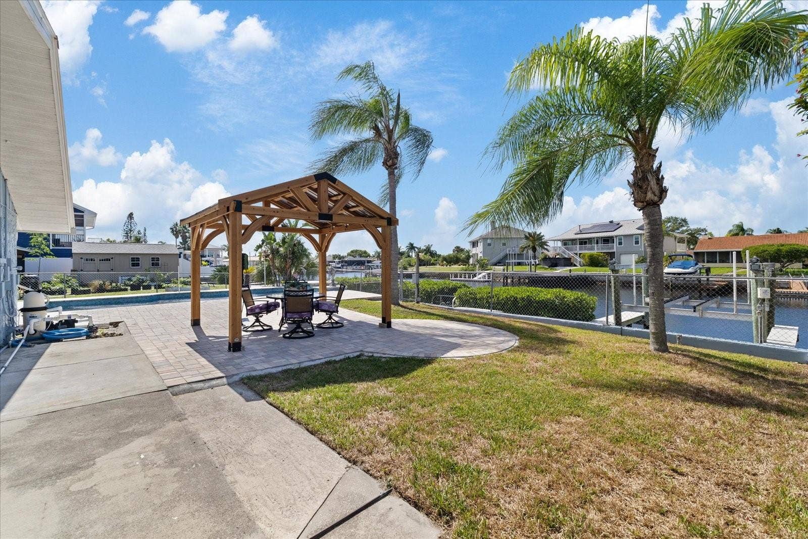 5001 MARLIN DRIVE, New Port Richey, FL 34652 Backyard view to wide canal