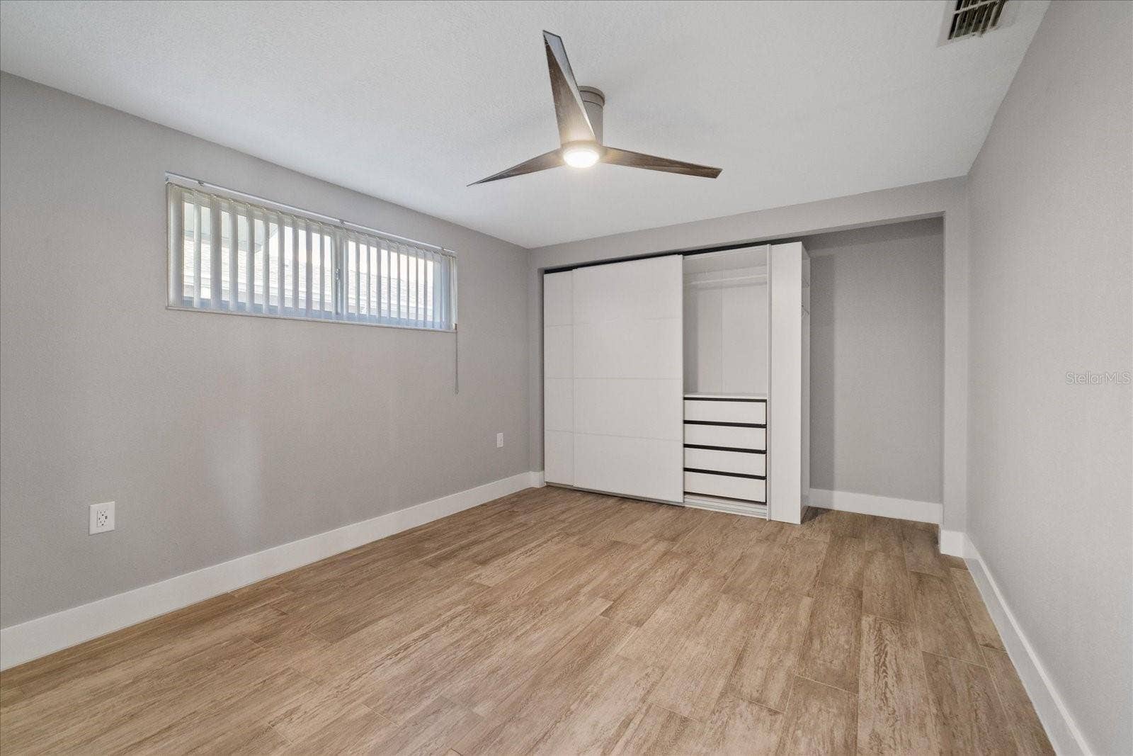 5001 MARLIN DRIVE, New Port Richey, FL 34652 2nd bedroom showing closet unit