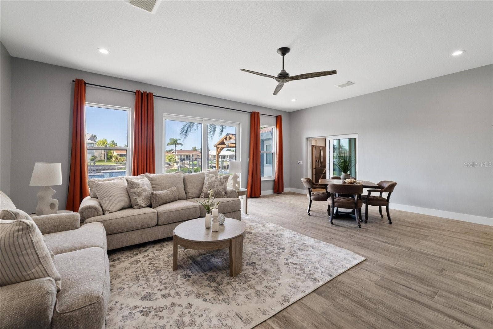 5001 MARLIN DRIVE, New Port Richey, FL 34652 Family room with pool views