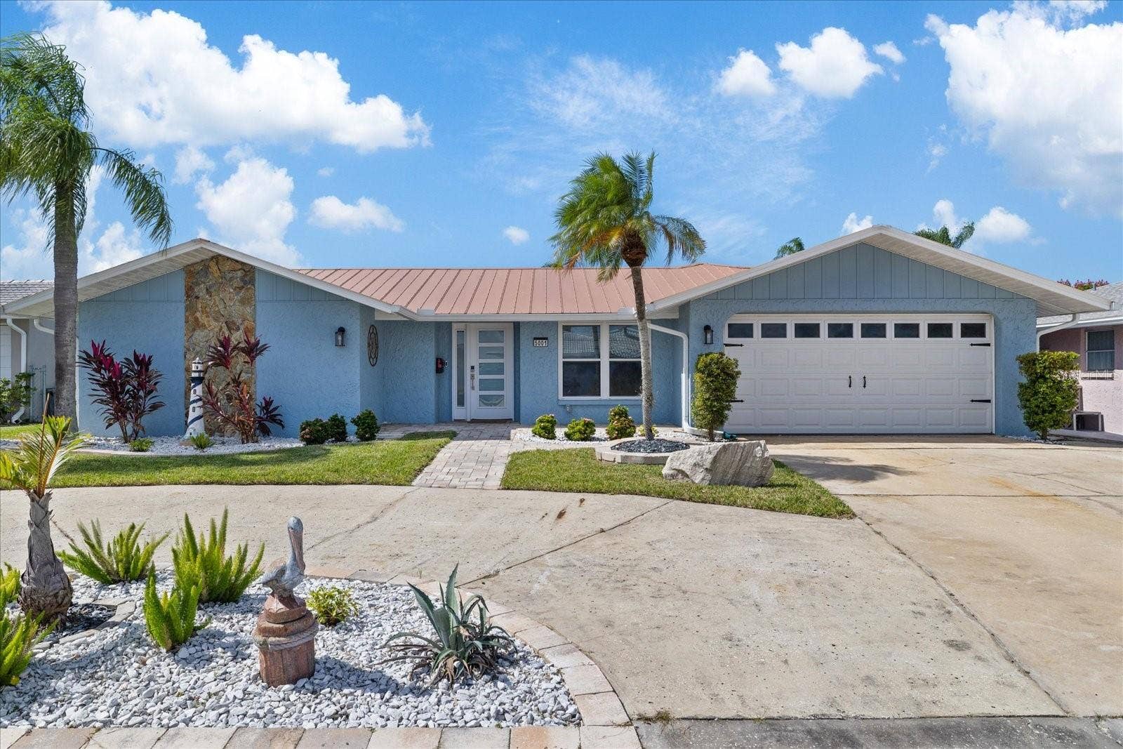 5001 MARLIN DRIVE, New Port Richey, FL 34652 Large driveway, landscaping and garage
