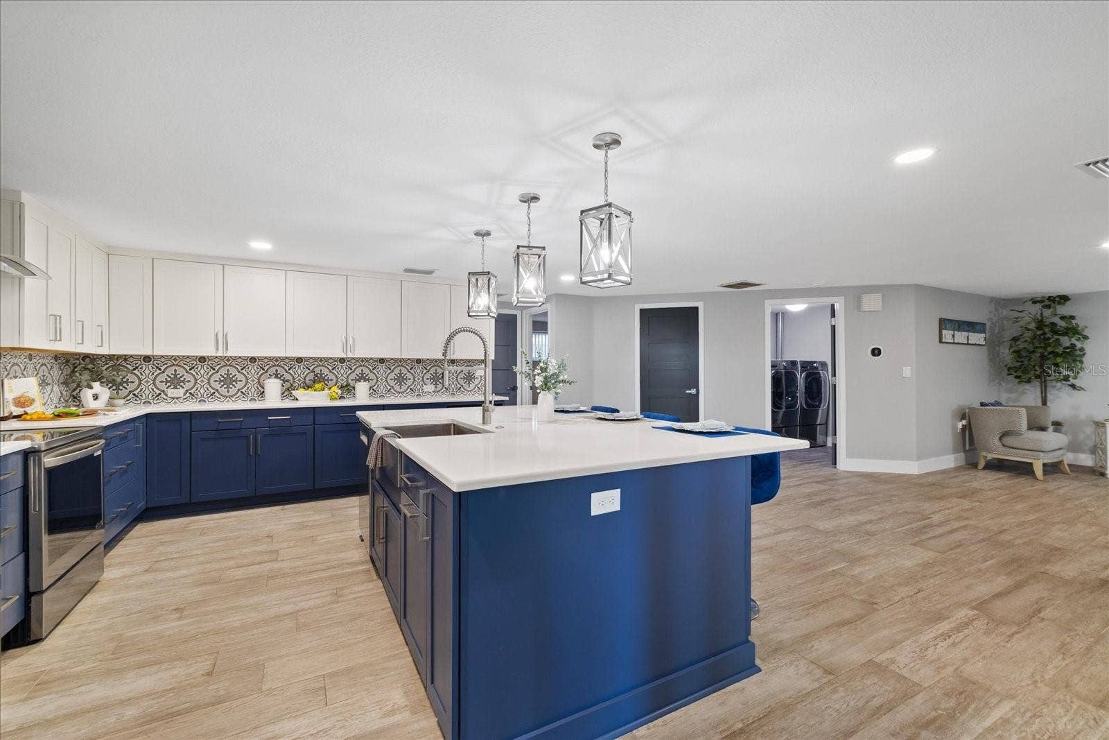 5001 MARLIN DRIVE, New Port Richey, FL 34652 Large island sink in kitchen with breakfast bar