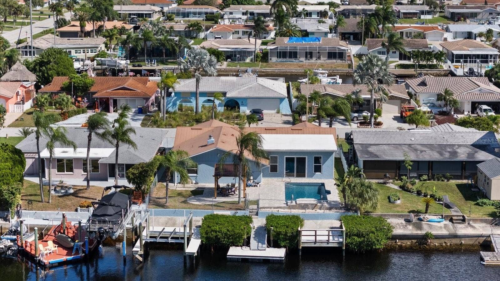 5001 MARLIN DRIVE, New Port Richey, FL 34652 Aerial view of pool,lift, both docks