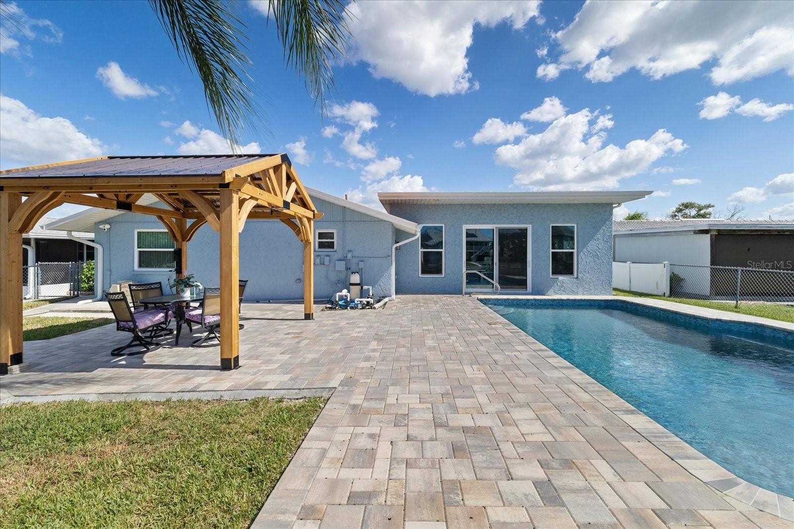 5001 MARLIN DRIVE, New Port Richey, FL 34652 Backyard Oasis with saltwater pool and gazebo