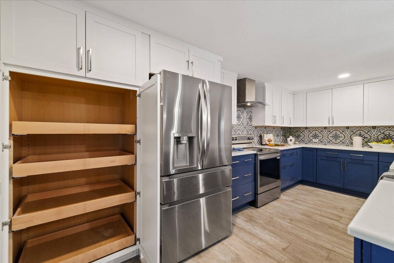 5001 MARLIN DRIVE, New Port Richey, FL 34652 Pantry with pull out shelves.