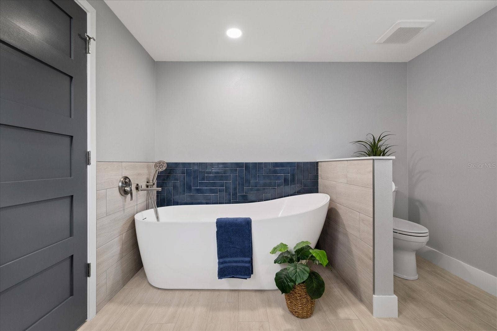 5001 MARLIN DRIVE, New Port Richey, FL 34652 Luxury soaking tub in primary near walk-in closet