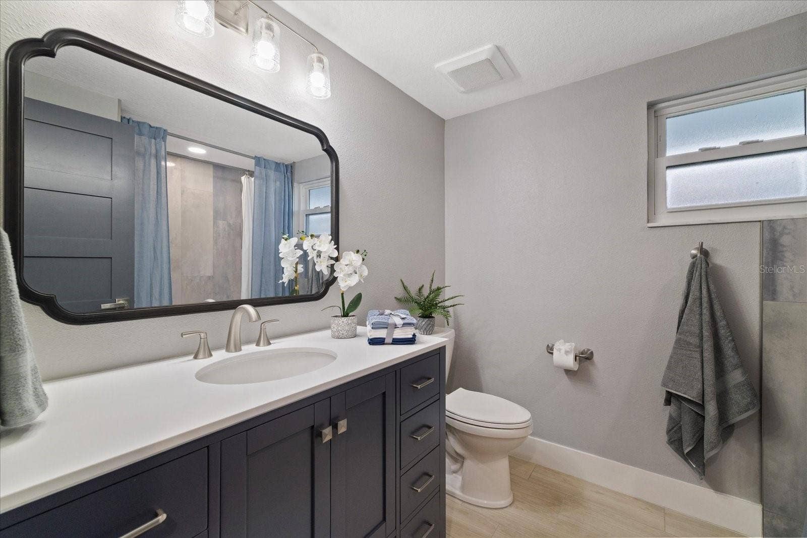 5001 MARLIN DRIVE, New Port Richey, FL 34652 2nd full bath in hallway between guest bedrooms