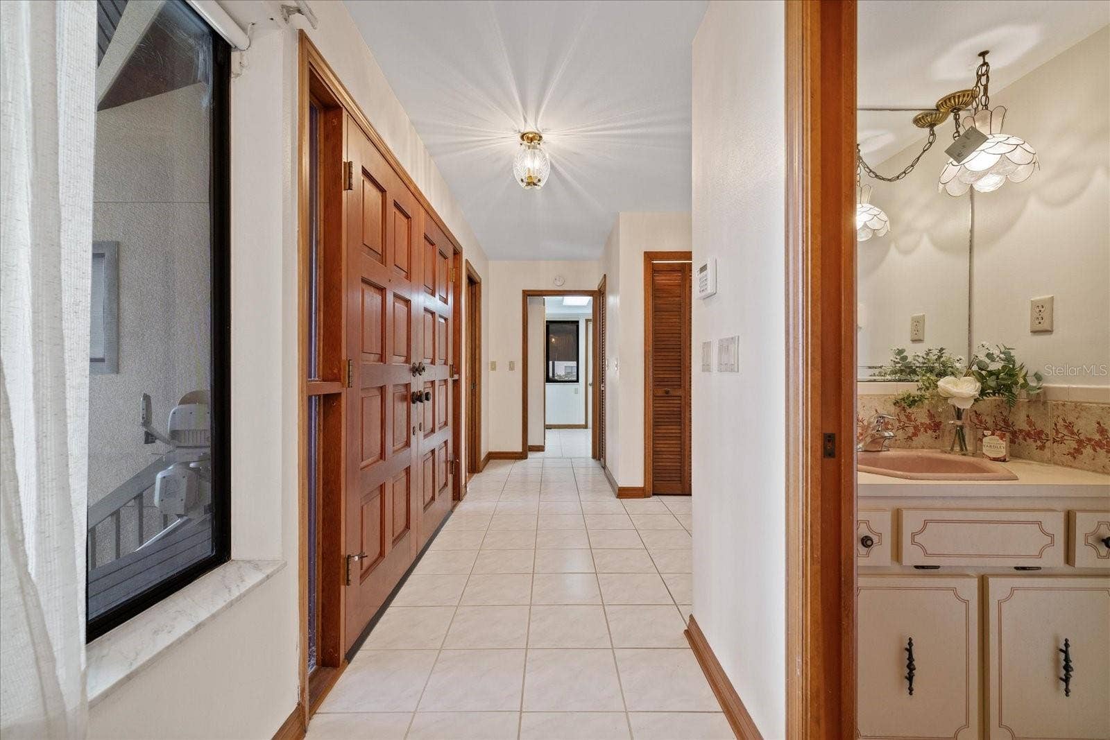 5767 WESTSHORE DRIVE, New Port Richey, FL 34652 Half bath at entry level