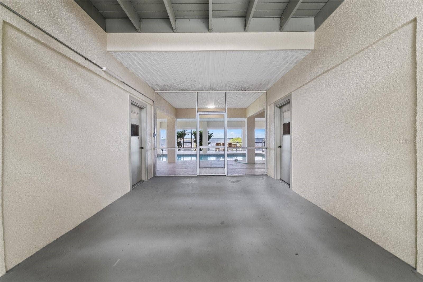 5767 WESTSHORE DRIVE, New Port Richey, FL 34652 Pool and garage entries