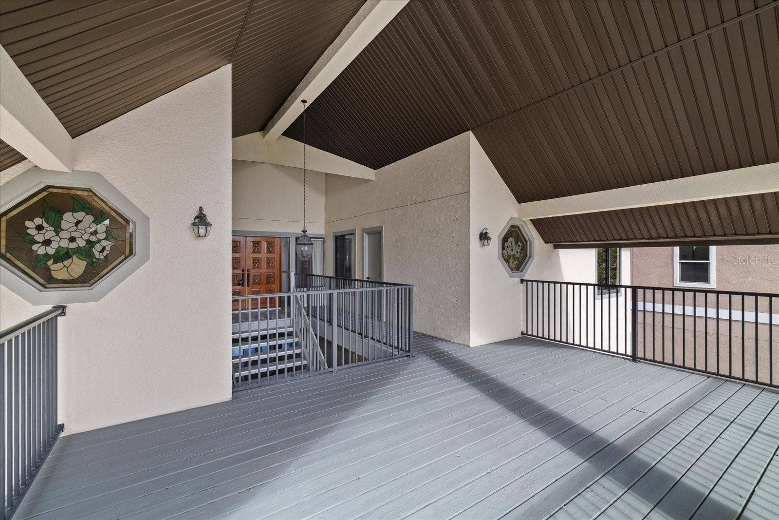 5767 WESTSHORE DRIVE, New Port Richey, FL 34652 Deck at front landing
